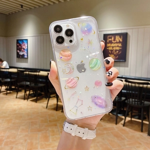 Detail of transparent glitter phone case with stars and planets for iPhone 17 Pro Max