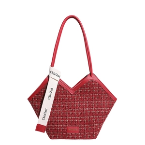 Minimalist deep red tweed tote bag for women with V-shaped opening and decorative straps