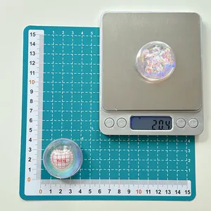 Detail of 4cm crystal ball phone grip with laser sequins and honey heart design