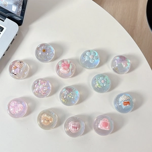 3D laser crystal flower and bear phone grip holders on white desk, cute resin accessory