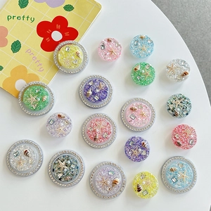 Sparkly ocean theme phone grip with starfish and pearls in colorful resin round designs