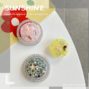 Sparkly ocean theme phone socket set with starfish shells and glitter in resin