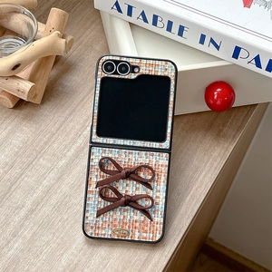 Detail of woven tweed phone case with brown 3D bows for Samsung Galaxy Z Flip series