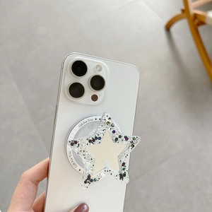 Détail du support téléphone en étoile avec paillettes résine et texte mine sur mobile blanc