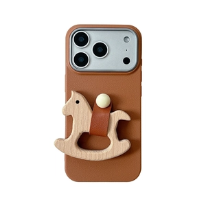 Brown leather iPhone case featuring a handcrafted 3D wooden rocking horse decoration