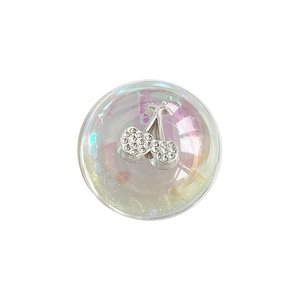 Iridescent bubble phone socket grip featuring a silver rhinestone-studded cherry design