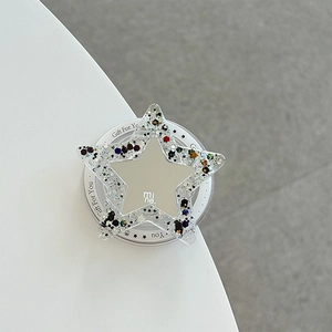 Détail du support de téléphone en étoile avec paillettes colorées et miroir argenté au centre