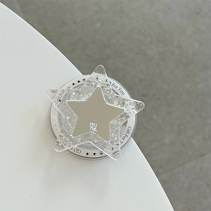 Détail du support de téléphone en forme d'étoile avec paillettes et petit miroir