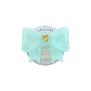 Mint green bow phone grip with golden heart relief on a clean white background