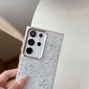 Macro view of Samsung S23 Ultra case featuring silver glitter and metal camera frame