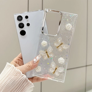 Detail of clear Samsung glitter case with 3D resin roses and gold-edged butterflies