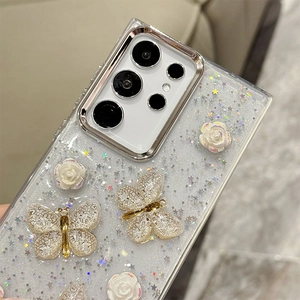 Detailed macro view of 3D white rose and gold butterfly on glitter Samsung phone case