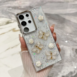 Detailed view of Galaxy case with 3D white roses, butterflies and silver glitter