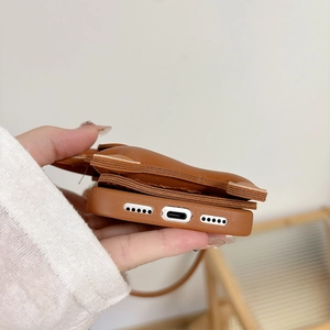 Close-up of precise cutouts and litchi grain leather texture for iPhone case