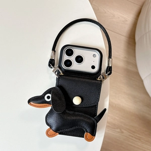 Close-up of black leather iPhone case with dachshund dog wallet and carry strap