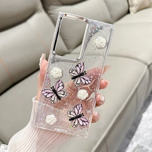 Detail of clear Samsung case with 3D white roses, purple butterflies and silver lens frame