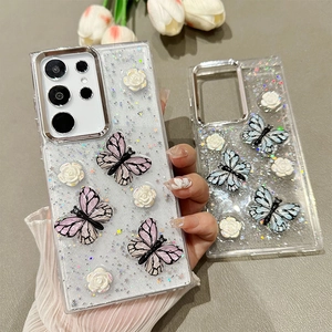 Clear glitter Samsung S25 case with 3D resin flowers and colorful butterfly charms