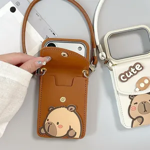 Close-up of capybara wallet phone case with leather card slot and crossbody strap