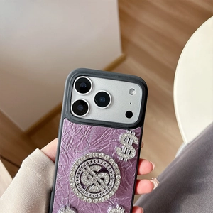 Close-up of purple wrinkled leather case with rotating rhinestone dollar sign for iPhone