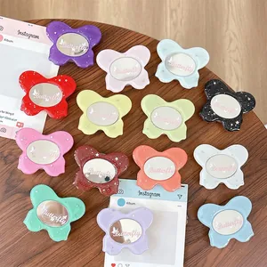 Glittery butterfly phone socket grip with makeup mirror in 14 vibrant colors