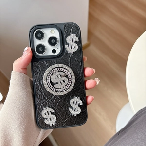 Macro detail of luxury black leather iPhone case featuring sparkling rhinestone dollar signs