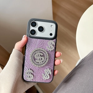Purple leather iPhone case with rhinestone dollar symbols and protective camera lens trim