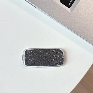 Close-up of snakeskin texture mirror phone stand with elegant gray marble finish