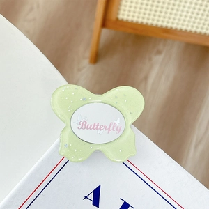 Sparkly light green butterfly phone grip with silver sequins and butterfly text