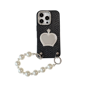 Luxurious iPhone case with black crocodile leather texture, crown mirror, and pearl strap