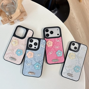 Python snakeskin texture iPhone case with 3D floral and pearl bow decoration