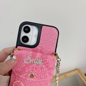 Pink snake pattern iPhone case with rhinestone Smile logo and crossbody gold chain