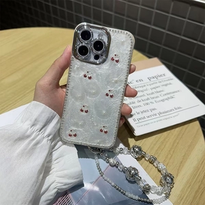 White pearl texture iPhone case with rhinestone cherry design and beaded hand strap