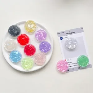 Colorful shell texture folding phone grip stand with holographic shimmer effect