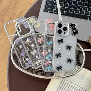 Glitter transparent iPhone case with 3D pearls and colorful bowknot charms in a mesh basket