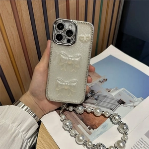 Coque de luxe pour iPhone avec paillettes, nœuds en strass et dragonne en grosses perles