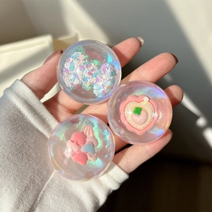 Three-piece set of iridescent bear and heart air cushion mobile phone holders in hand
