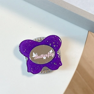 Detail of glitter purple butterfly phone grip with mirror and rhinestones