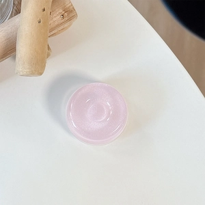 Nahaufnahme der rosa Glitzer-Donut Handyhalterung mit schimmernder Harztextur