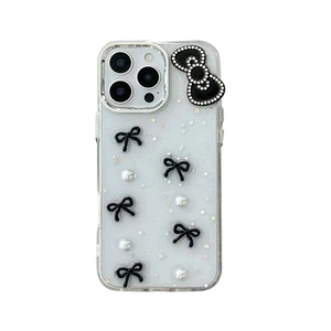 Glitter transparent iPhone case with black 3D bows, white pearls, and star sequins