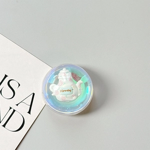 Macro detail of laser aurora phone grip featuring 3D teapot with rose flower and Honey text