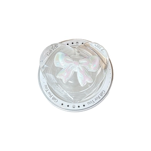 Transparent heart phone grip with iridescent bow and Magsafe suction base