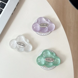 Set of glitter cloud phone socket stands in purple, white, and mint green colors