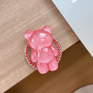 Pink glitter bear phone socket stand with decorative colorful bead trim detail