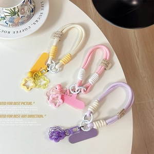 Handmade woven star phone lanyard straps in bright yellow, pink and purple shades