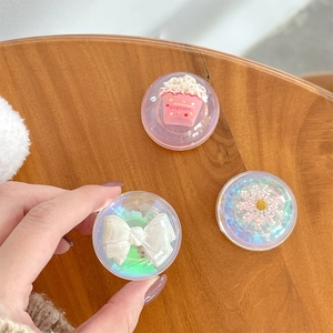 Three-piece set of 3D laser crystal ball phone grips with popcorn and bow designs