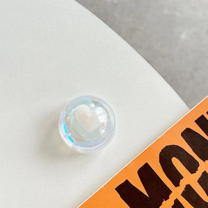 Detailed view of 3D heart crystal phone grip with iridescent gradient effect
