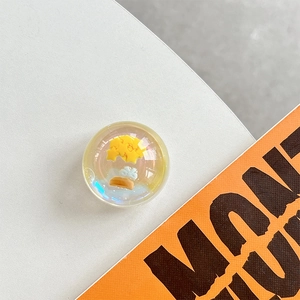 Macro detail of laser crystal ball phone socket with star and cloud elements