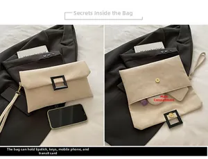Detail of beige envelope clutch bag showing magnetic closure and interior storage capacity