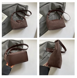 Detailed views of brown suede shoulder bag with smooth leather base and adjustable strap