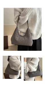 Detailed close-up of a leopard print hobo bag showing texture and crescent shape